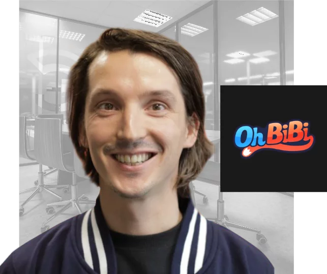Photo portrait de Martial Valery avec un logo du studio de jeux vidéo Ohbibi